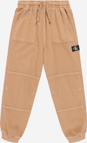 Calvin Klein Jeans Tapered Broek in Oranje: voorkant