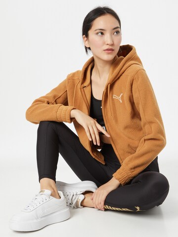 PUMA Urheilullinen collegetakki värissä beige