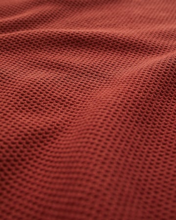 Geacă tricotată de la WE Fashion pe roșu