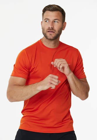 ENDURANCE - Camiseta funcional 'Vernon' en naranja: frente