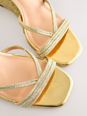 Next - Sandalias en oro