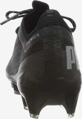 PUMA Soccer shoe 'ULTRA 1.1 FG/AG' in Black