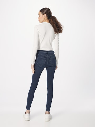 Skinny Jeans 'MOLLY' di River Island in blu