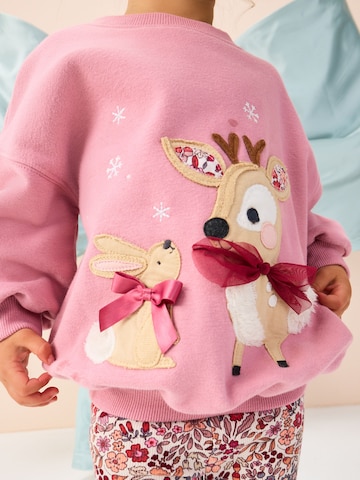 Set Next en rose