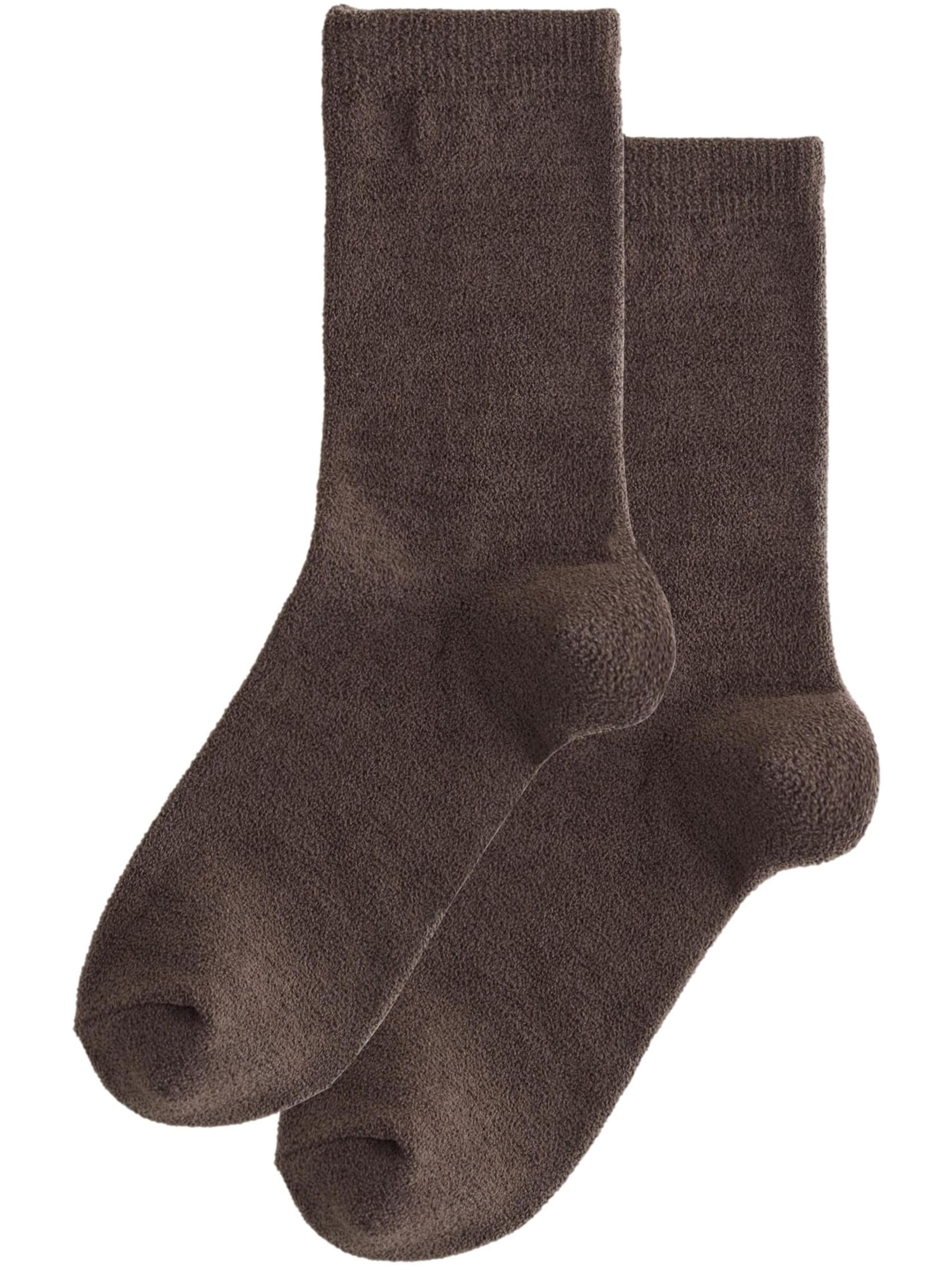 Next Sockor i brun: framsida