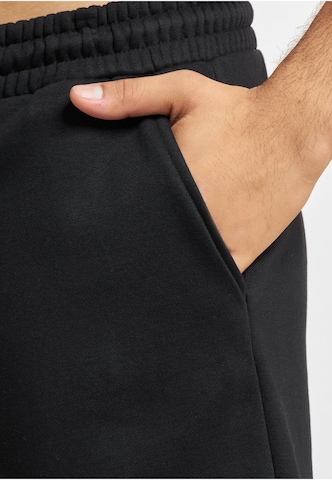 regular Pantaloni di ROCAWEAR in nero