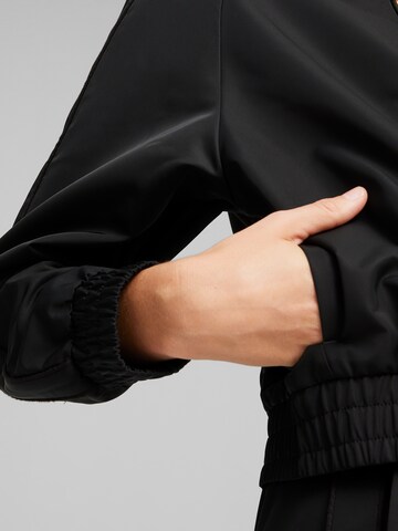 PUMA Between-season jacket in Black