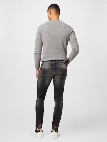 Goldgarn Skinny Jeans i grå