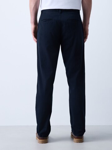 Next Slimfit Chinobyxa i blå