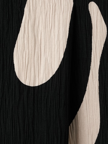 Wide leg Pantaloni 'NIKITA' di MANGO in nero