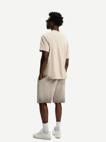 Bershka Loosefit Bukser i grå