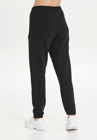ENDURANCE Tapered Sports trousers 'Beisty' in Black