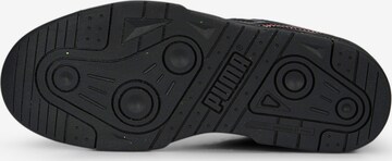 Baskets basses PUMA en noir