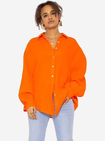 SASSYCLASSY Blus i orange: framsida