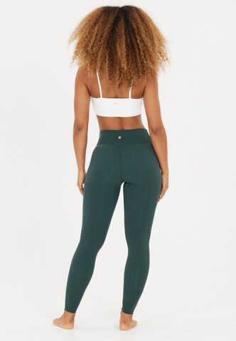 Athlecia Skinny Sports trousers 'Luxe' in Green