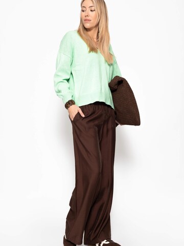 SASSYCLASSY Loose fit Trousers in Brown
