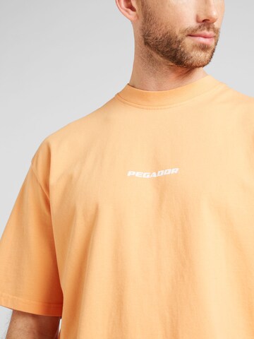 T-Shirt 'COLNE' Pegador en orange