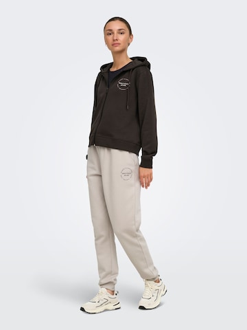 ONLY PLAY - Sudadera con cremallera deportiva 'ONPCava' en marrón