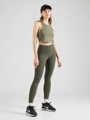 Skinny Pantaloni sportivi 'ZENVY' di NIKE in verde