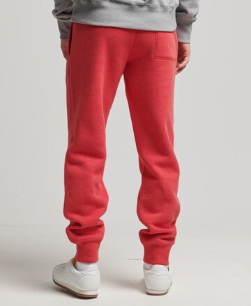 Effilé Pantalon Superdry en rouge