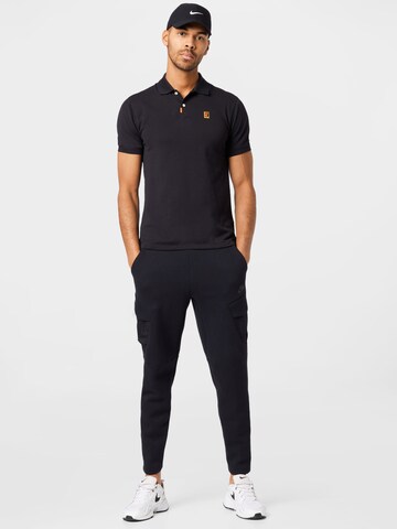 Nike SportswearSlimfit Hlače 'UTILITY' - crna boja