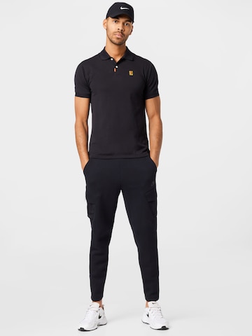 Nike Sportswear Slimfit Kalhoty 'UTILITY' – černá