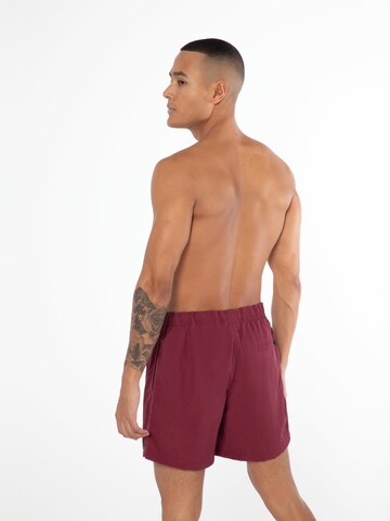 Shorts de bain 'Faster' PROTEST en rouge