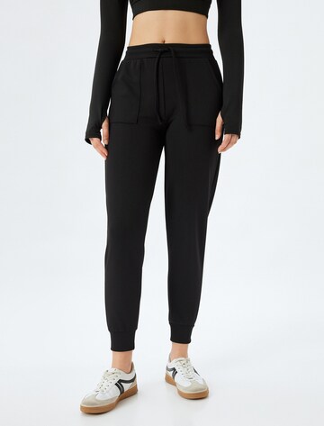 Koton Tapered Hose in Schwarz: Vorderseite