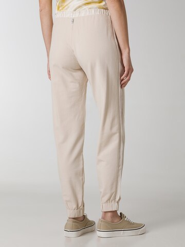 Tapered Pantaloni sportivi di DEHA in beige