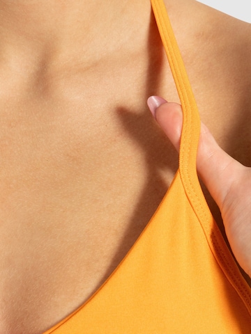 Smilodox Sports top ' Esta ' in Orange