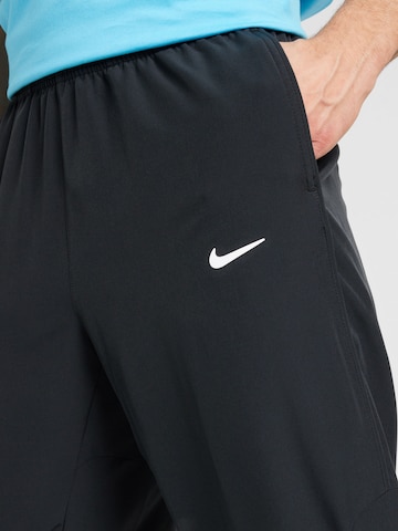 NIKE Loosefit Sporthose 'Advantage' in Schwarz