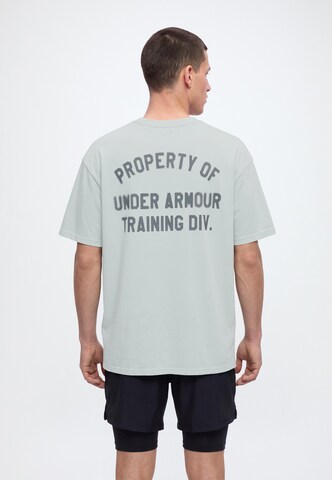 UNDER ARMOUR - Camiseta funcional 'PROPERTY OF UA' en gris: frente