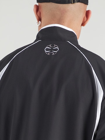 ADIDAS ORIGINALS - Chaqueta de entretiempo 'Teamgeist Adicolor' en negro