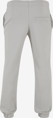 Tapered Pantaloni di Urban Classics in grigio