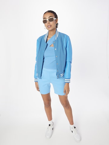 Top di Urban Classics in blu