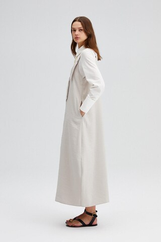 Touche Prive Jurk in Beige