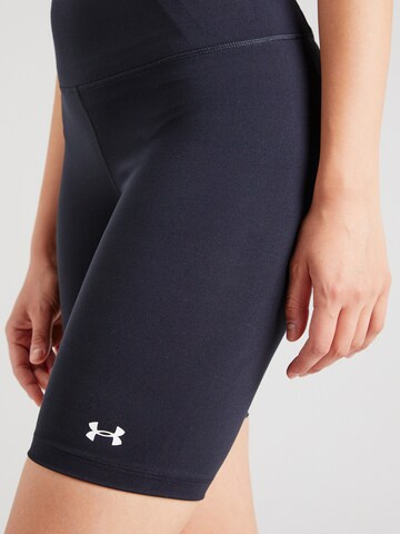 Skinny Pantalon de sport 'Motion' UNDER ARMOUR en noir