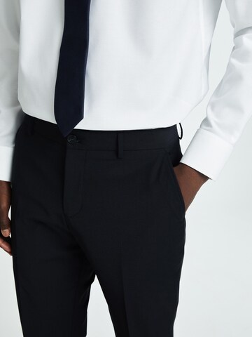 Slimfit Pantaloni con piega frontale di SELECTED in nero