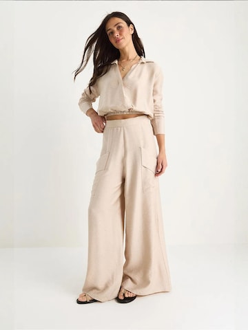 Pantalons de tailleur Bianco Lucci en beige