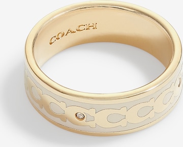 COACH - Anel em branco: frente