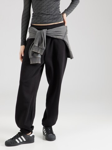 WEEKDAY Tapered Pants in Black: front