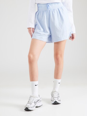 Largi Pantaloni de la Nike Sportswear pe albastru: față