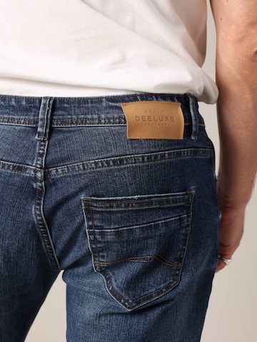 Coupe slim Jean 'Carlos' Deeluxe en bleu