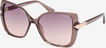 Lunettes de soleil GUESS en beige : devant