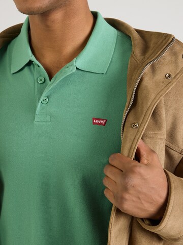 LEVI'S ® Poloshirt 'Housemark' in Grün