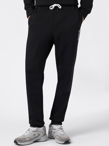 Effilé Pantalon Champion Authentic Athletic Apparel en noir : devant