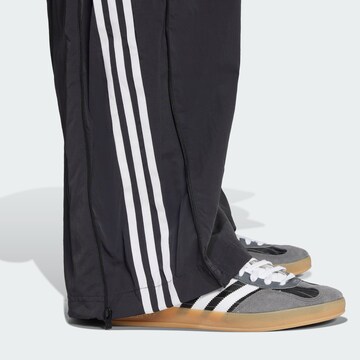 ADIDAS ORIGINALS Loose fit Trousers 'Adilenium Season 3' in Black