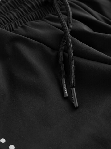 Next - Loosefit Pantalón deportivo en negro