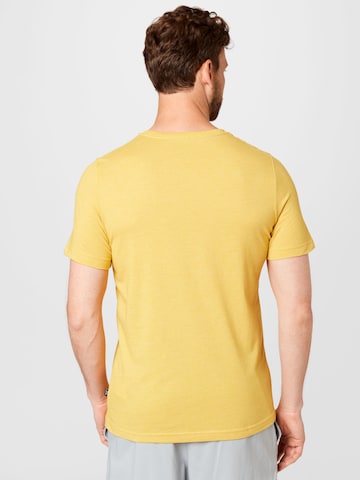 PUMA - Camiseta funcional en amarillo