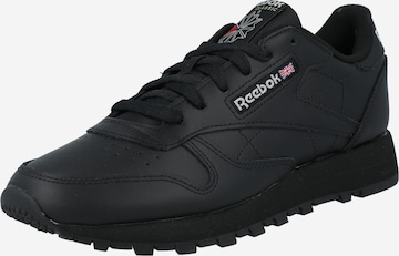 Baskets basses 'Classic' Reebok en noir : devant